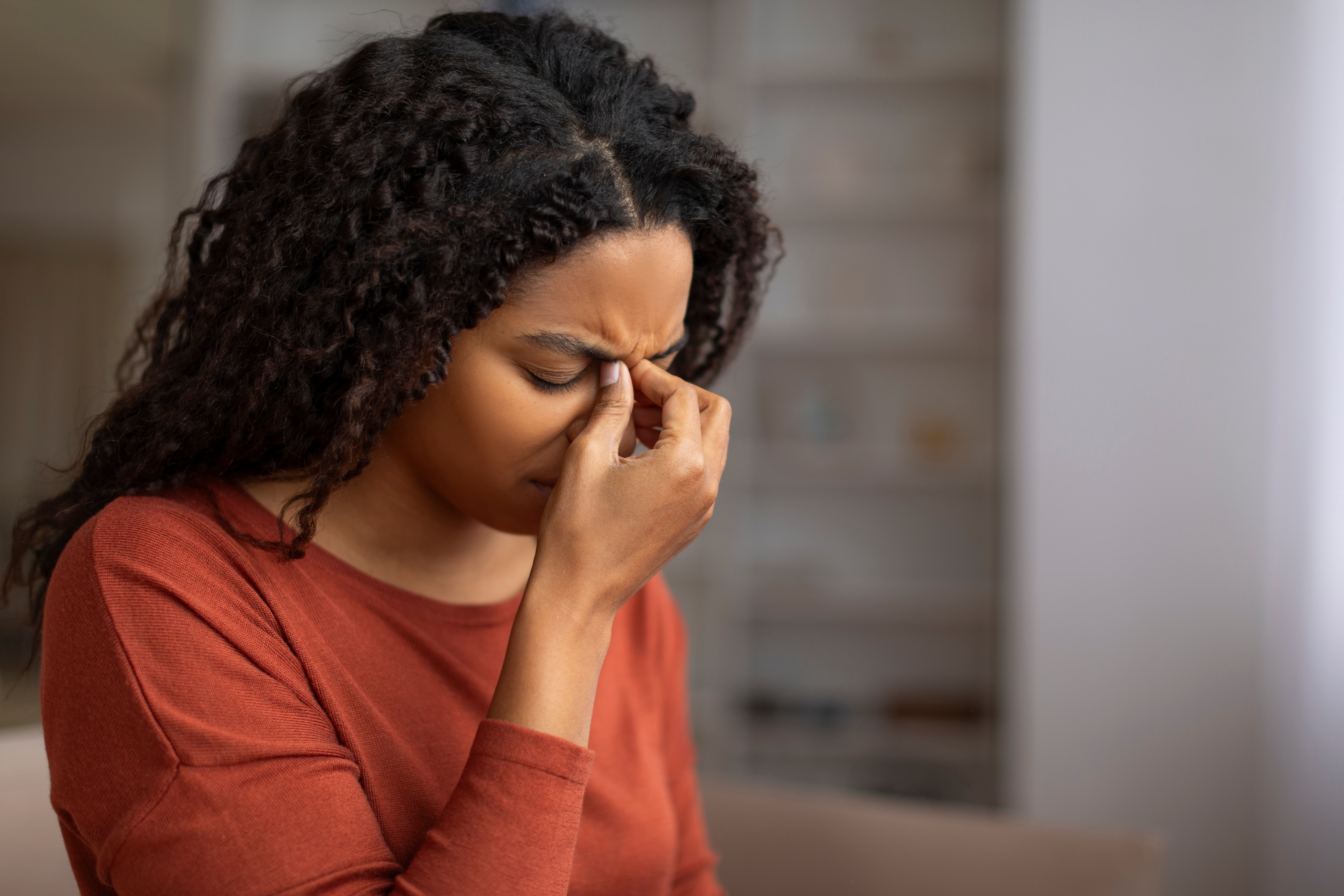 Woman feeling fatigued who may benefit from autoimmune testing